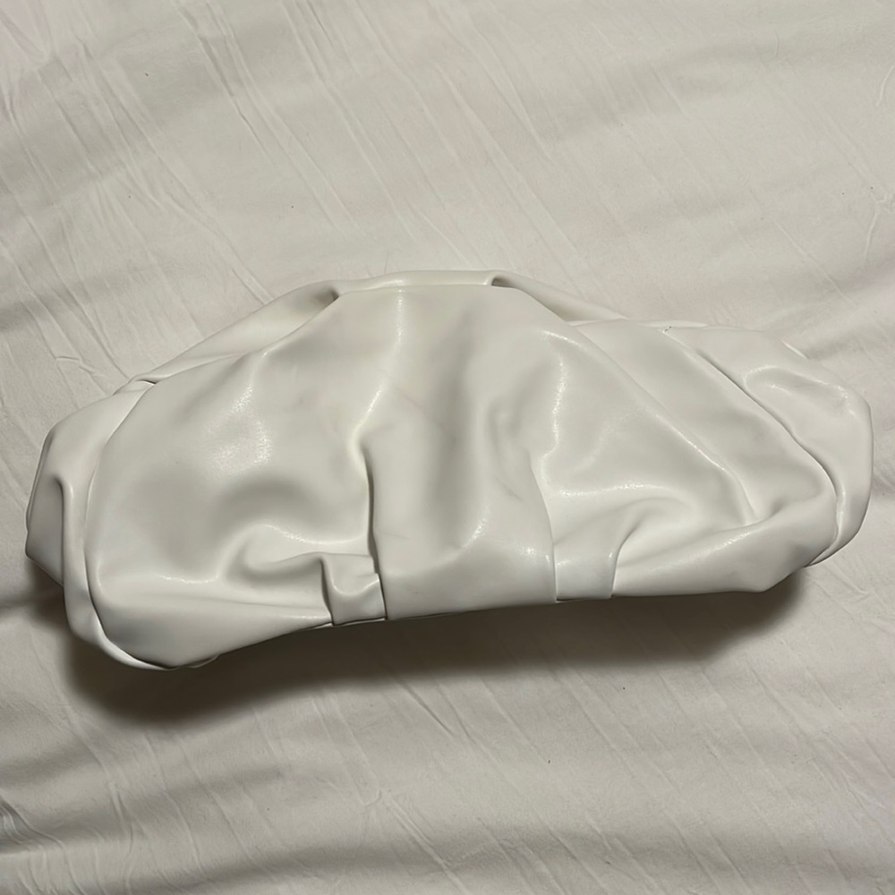 White puff clutch bag